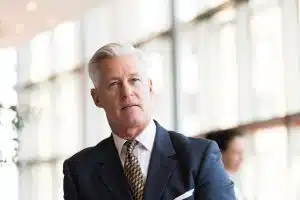 portrait of handsome senior business man at modern office