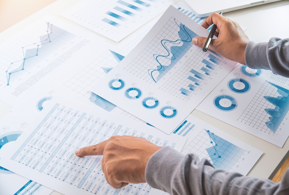 businessman working data document graph chart report marketing r Data Integration and Management